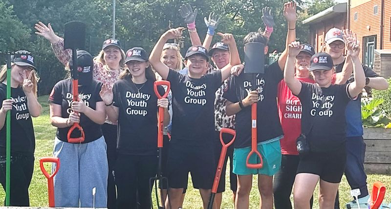 Members of Dudley Youth Group at work on the gardening project