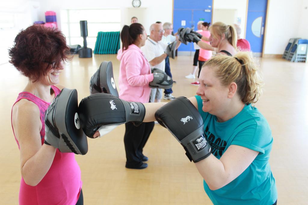 Weight Worries participants Lucy Mott (left) and Rebecca Ward enjoy the Boxercise class.  